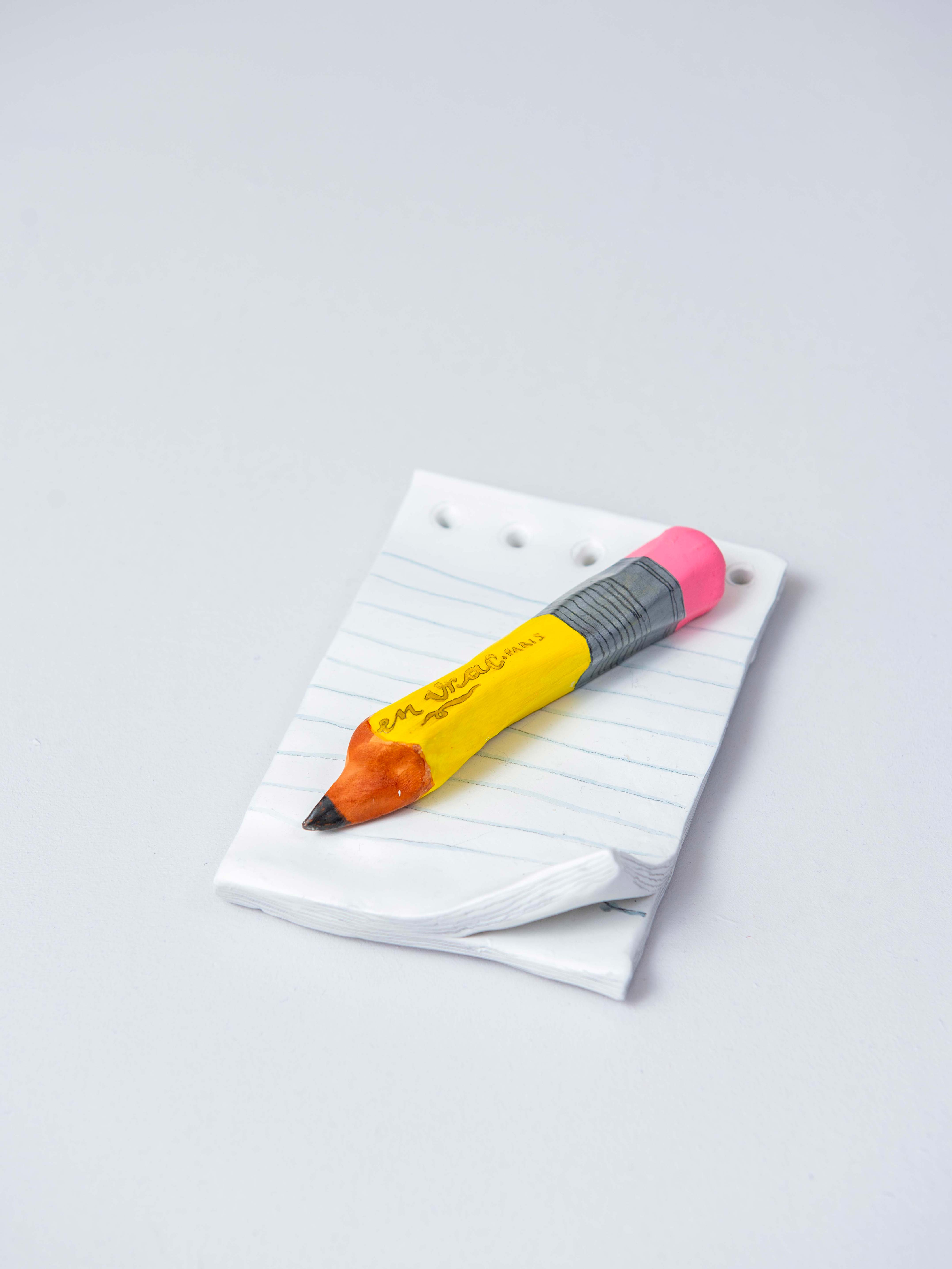 Bloc notes et crayon à papier